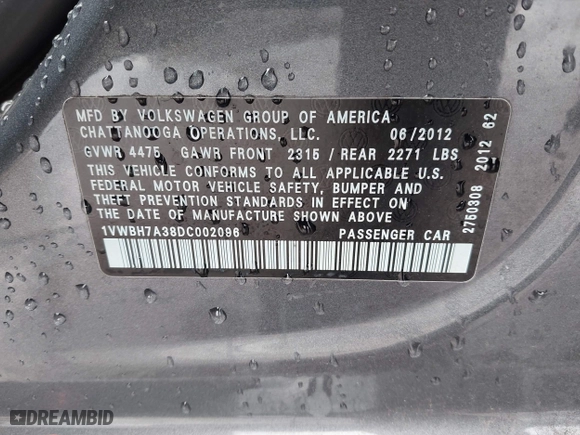 2013 Volkswagen Passat SE w/Sunroof with VIN 1VWBH7A38DC002096, listed as a IAAI auction lot 41904594 with 134,738 mi miles. Bid and sale history available at carsss.com. Image 9.