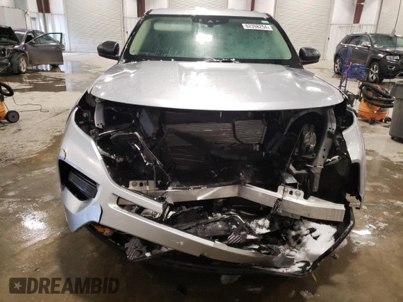2023 Ford Explorer with VIN 1FMSK8BH3PGA18056, listed as a Copart auction lot 82398254 with 35,237 mi miles and Salvage title. Bid and sale history available at DreamBid. Image 5.