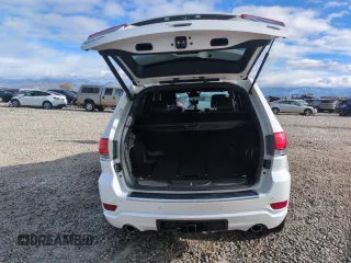 2017 Jeep Grand Cherokee Overland with VIN 1C4RJFCG7HC707767, listed as a Copart auction lot 82345154 with 96,374 mi miles and Salvage Title. Bid and sale history available at carsss.com. Image 6.