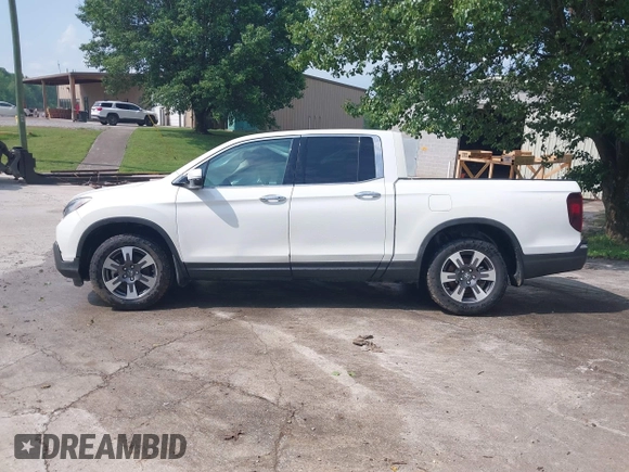 2018 Honda Ridgeline RTL-E z VIN 5FPYK3F72JB007125, wystawiony jako IAAI lot #42032247 z przebiegiem 89 558 mil mil oraz . Historia ofert i sprzedaży dostępna na DreamBid. Obrazek 14.