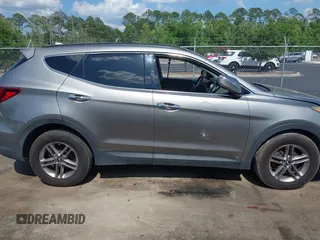 2017 Hyundai Santa Fe 2.4L z VIN 5NMZU3LB7HH025791, wystawiony jako IAAI lot #42277964 z przebiegiem 154 110 mil mil oraz . Historia ofert i sprzedaży dostępna na DreamBid. Obrazek 13.