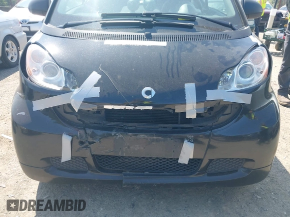 2012 Smart fortwo Pure z VIN WMEEJ3BAXCK526477, wystawiony jako IAAI lot #42392611 z przebiegiem 143 378 mil mil oraz . Historia ofert i sprzedaży dostępna na DreamBid. Obrazek 6.