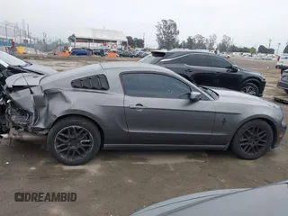 2013 Ford Mustang V6 with VIN 1ZVBP8AM6D5241569, listed as a IAAI auction lot 41884583 with 100,700 mi miles. Bid and sale history available at carsss.com. Image 14.