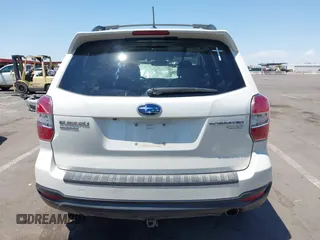 2015 Subaru Forester Touring with VIN JF2SJAWC8FH588321, listed as a IAAI auction lot 42689364 with 103,642 mi miles and . Bid and sale history available at DreamBid. Image 16.