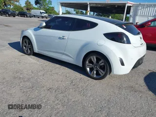 2014 Hyundai Veloster with VIN KMHTC6AD5EU193136, listed as a IAAI auction lot 41836596 with 160,460 mi miles. Bid and sale history available at carsss.com. Image 3.