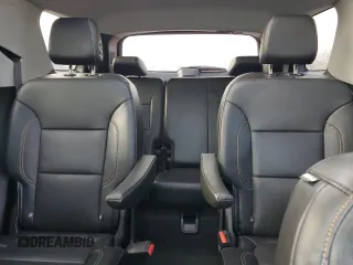 2018 Chevrolet Traverse Premier z VIN 1GNEVJKWXJJ280737, wystawiony jako Copart lot #55680005 z przebiegiem 83 098 mil mil oraz Szkoda całkowita • Salvage title. Historia ofert i sprzedaży dostępna na DreamBid. Obrazek 10.
