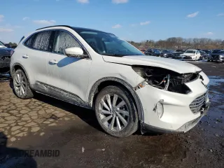 2021 Ford Escape Titanium Hybrid with VIN 1FMCU9DZ0MUA36540, listed as a Copart auction lot 42286485 with 46,908 mi miles and Salvage title. Bid and sale history available at DreamBid. Image 4.