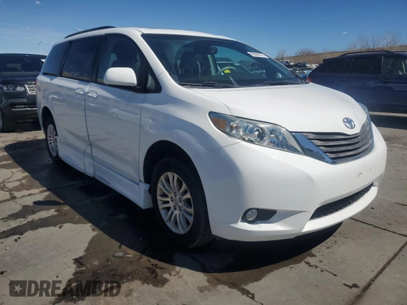2011 Toyota Sienna XLE AAS with VIN 5TDYK3DC7BS007529, listed as a Copart auction lot 49642475 with 115,117 mi miles and Salvage Title. Bid and sale history available at carsss.com. Image 4.