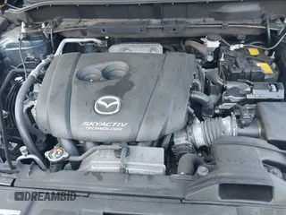 2017 Mazda CX-5 Touring with VIN JM3KFBCL6H0170455, listed as a IAAI auction lot 40381242 with 71,520 mi miles. Bid and sale history available at carsss.com. Image 10.