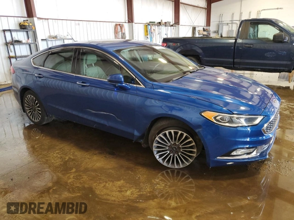 2017 Ford Fusion Titanium z VIN 3FA6P0D99HR162354, wystawiony jako Copart lot #61753395 z przebiegiem 100 678 mil mil oraz Szkoda całkowita • Salvage title. Historia ofert i sprzedaży dostępna na DreamBid. Obrazek 4.
