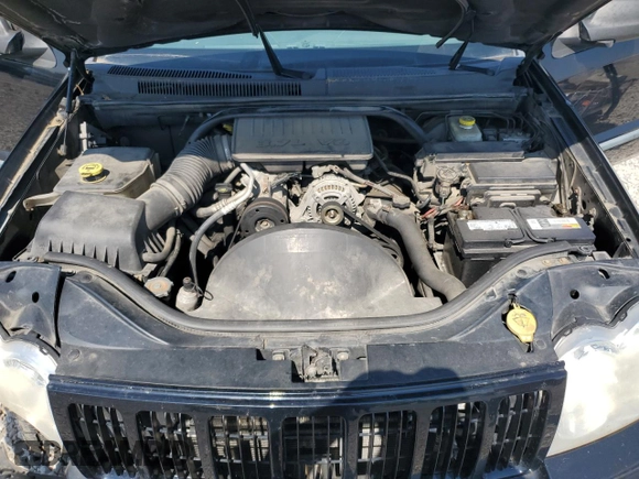 2007 Jeep Grand Cherokee Laredo z VIN 1J8GR48K17C668294, wystawiony jako Copart lot #56686165 z przebiegiem 245 172 mil mil oraz Szkoda całkowita • Salvage title. Historia ofert i sprzedaży dostępna na DreamBid. Obrazek 12.