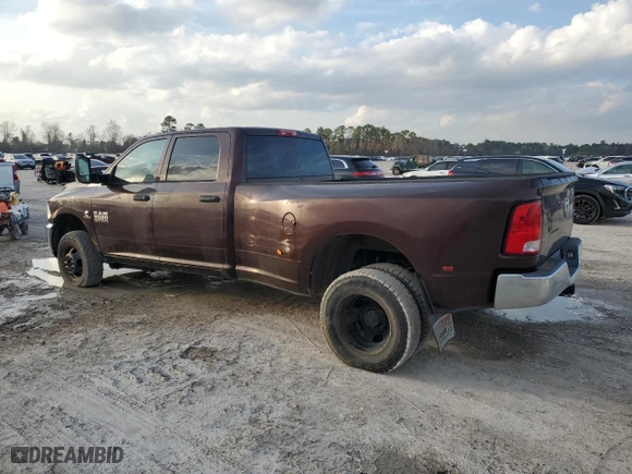 2014 Ram 3500 Tradesman with VIN 3C63RRGL1EG216344, listed as a Copart auction lot 44233705 with 106,311 mi miles and Salvage Title. Bid and sale history available at carsss.com. Image 2.