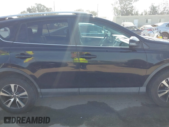 2016 Toyota RAV4 XLE with VIN 2T3RFREV6GW459313, listed as a IAAI auction lot 42074337 with 149,914 mi miles and . Bid and sale history available at DreamBid. Image 13.