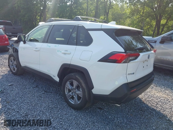 2023 Toyota RAV4 Hybrid LE with VIN JTMLWRFV3PD188020, listed as a IAAI auction lot 42424244 with 69,863 mi miles and . Bid and sale history available at DreamBid. Image 3.