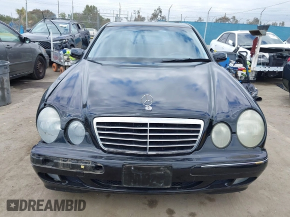 2001 Mercedes-Benz E 320 with VIN WDBJF65J91B363439, listed as a IAAI auction lot 42058536 with 61,272 mi miles and . Bid and sale history available at DreamBid. Image 12.