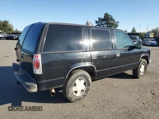1996 GMC Yukon with VIN 1GKEK13R1TJ741714, listed as a Copart auction lot 46814635 with 406,969 mi miles and Salvage Title. Bid and sale history available at carsss.com. Image 3.
