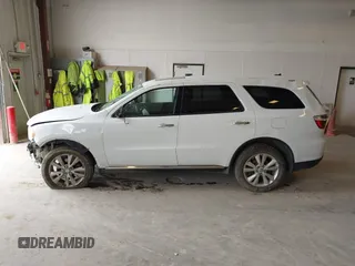 2013 Dodge Durango Crew z VIN 1C4SDJDT3DC540700, wystawiony jako IAAI lot #42097270 z przebiegiem 197 195 mil mil oraz . Historia ofert i sprzedaży dostępna na DreamBid. Obrazek 14.