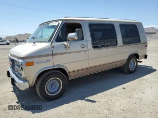 1994 GMC Vandura z VIN 1GDEG25K4RF512695, wystawiony jako Copart lot #63562414 z przebiegiem 171 855 mil mil oraz Szkody całkowita. Historia ofert i sprzedaży dostępna na DreamBid. Obrazek 1.