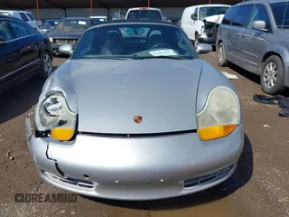 1999 Porsche Boxster z VIN WP0CA2989XU627152, wystawiony jako IAAI lot #41805432 z przebiegiem 112 380 mil mil oraz . Historia ofert i sprzedaży dostępna na DreamBid. Obrazek 12.