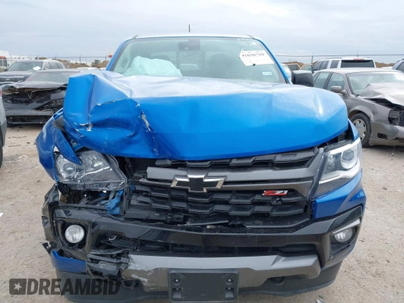 2022 Chevrolet Colorado 4WD Z71 with VIN 1GCGTDEN1N1316915, listed as a IAAI auction lot 41636710 with 13,543 mi miles and . Bid and sale history available at DreamBid. Image 12.