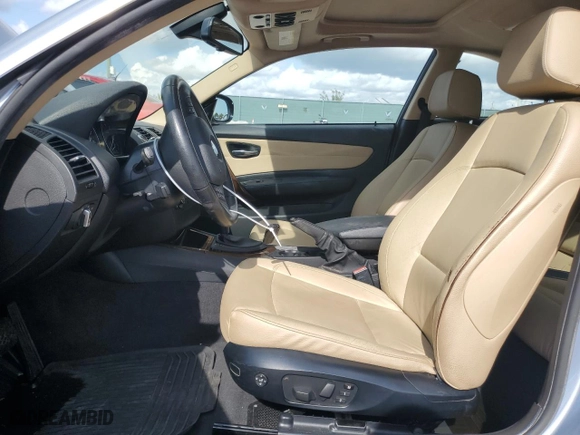 2012 BMW 1 Series 128i with VIN WBAUP7C56CVP22221, listed as a Copart auction lot 85557194 with 41,518 mi miles and Salvage Title. Bid and sale history available at carsss.com. Image 7.