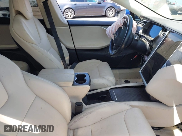 2017 Tesla Model S 100D with VIN 5YJSA1E44HF220391, listed as a IAAI auction lot 37381201 with Not Provided miles and . Bid and sale history available at DreamBid. Image 5.