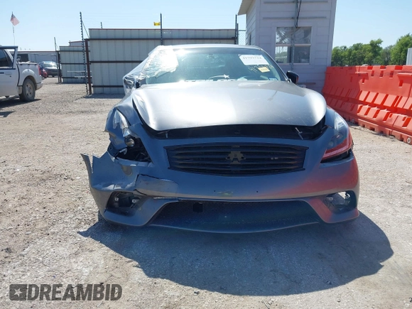2014 Infiniti Q60 Journey z VIN JN1CV6EK1EM110800, wystawiony jako IAAI lot #41793724 z przebiegiem 134 408 mil mil oraz . Historia ofert i sprzedaży dostępna na DreamBid. Obrazek 13.