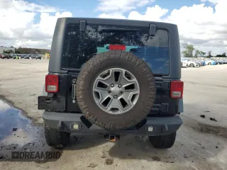 2016 Jeep Wrangler Rubicon with VIN 1C4BJWCG3GL162649, listed as a Copart auction lot 86327414 with 131,407 mi miles and Salvage title. Bid and sale history available at DreamBid. Image 6.