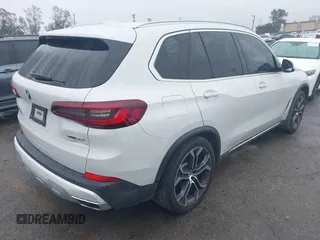 2021 BMW X5 sDrive40i with VIN 5UXCR4C03M9F24817, listed as a IAAI auction lot 41512172 with 54,867 mi miles. Bid and sale history available at carsss.com. Image 4.