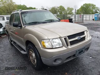 2003 Ford Explorer Sport Trac XLS z VIN 1FMZU67E73UC81240, wystawiony jako IAAI lot #41980985 z przebiegiem 114 644 mil mil oraz . Historia ofert i sprzedaży dostępna na DreamBid. Obrazek 1.
