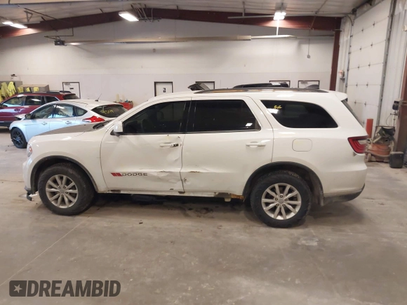2014 Dodge Durango SXT z VIN 1C4RDJAG5EC476294, wystawiony jako IAAI lot #41901092 z przebiegiem 195 293 mil mil oraz . Historia ofert i sprzedaży dostępna na DreamBid. Obrazek 14.