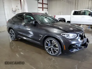 2020 BMW X4 M Competition z VIN 5YMUJ0C05L9B44115, wystawiony jako Copart lot #55556755 z przebiegiem Nie podano mil oraz Szkody całkowita. Historia ofert i sprzedaży dostępna na DreamBid. Obrazek 4.