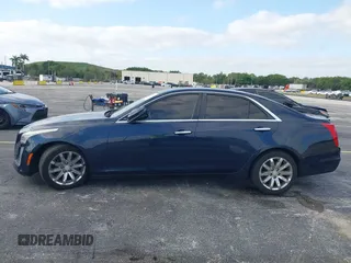 2016 Cadillac CTS RWD with VIN 1G6AP5SX8G0119984, listed as a IAAI auction lot 42098257 with 98,593 mi miles and . Bid and sale history available at DreamBid. Image 14.