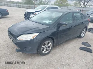 2013 Ford Focus SE with VIN 1FADP3F25DL209199, listed as a IAAI auction lot 42086573 with 136,999 mi miles. Bid and sale history available at carsss.com. Image 2.