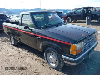 1990 Ford Ranger XLT with VIN 1FTCR10AXLUB92428, listed as a IAAI auction lot 41710370 with 31,036 mi miles. Bid and sale history available at carsss.com. Image 1.