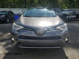 2018 Toyota RAV4 XLE with VIN JTMWFREV5JJ747297, listed as a Copart auction lot 56371505 with 215,598 mi miles and Clean Title. Bid and sale history available at DreamBid. Image 6.