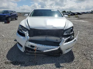 2014 Lexus LS 460 z VIN JTHCL5EF5E5022213, wystawiony jako Copart lot #55564585 z przebiegiem 176 053 mil mil oraz Szkoda całkowita • Salvage title. Historia ofert i sprzedaży dostępna na DreamBid. Obrazek 5.