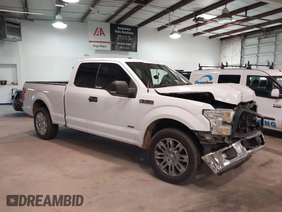 2015 Ford F-150 XL with VIN 1FTEX1CG5FKD31637, listed as a IAAI auction lot 41607827 with 201,278 mi miles. Bid and sale history available at carsss.com. Image 1.