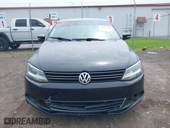 2013 Volkswagen Jetta SE z VIN 3VWDX7AJ5DM258429, wystawiony jako IAAI lot #42372776 z przebiegiem 211 579 mil mil oraz . Historia ofert i sprzedaży dostępna na DreamBid. Obrazek 12.