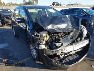 2014 Mazda 5 Sport with VIN JM1CW2BL1E0163682, listed as a IAAI auction lot 41344215 with 63,811 mi miles and . Bid and sale history available at carsss.com. Image 1.