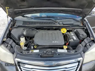 2014 Chrysler Town & Country Touring L 30th Anniversary with VIN 2C4RC1CG4ER310999, listed as a Copart auction lot 53379475 with 139,857 mi miles and Salvage Title. Bid and sale history available at DreamBid. Image 12.