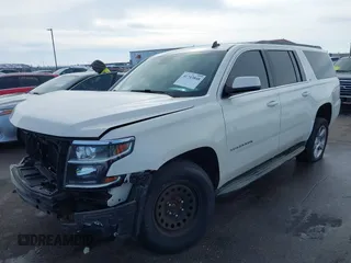 2015 Chevrolet Suburban LT with VIN 1GNSKJKC0FR309866, listed as a IAAI auction lot 41743848 with 220,778 mi miles and . Bid and sale history available at DreamBid. Image 17.