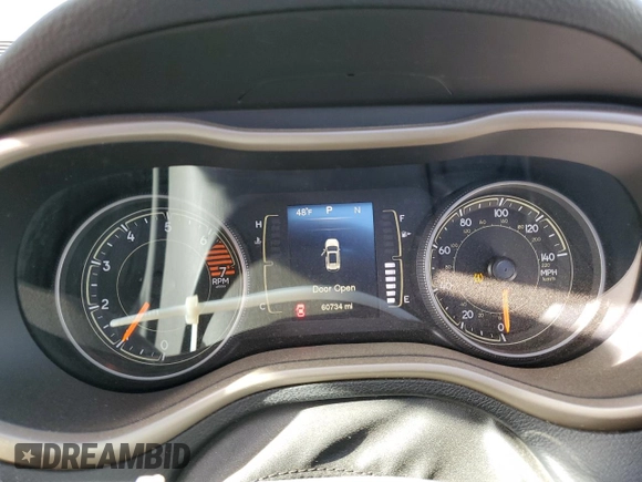 2016 Jeep Cherokee 75th Anniversary with VIN 1C4PJMCB0GW289145, listed as a Copart auction lot 83465164 with 60,734 mi miles and Salvage Title. Bid and sale history available at carsss.com. Image 9.