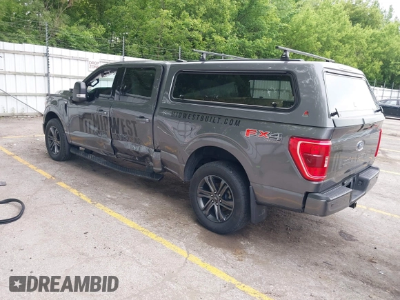 2021 Ford F-150 XL with VIN 1FTFW1E58MFA37383, listed as a IAAI auction lot 42396331 with 149,965 mi miles and . Bid and sale history available at DreamBid. Image 3.
