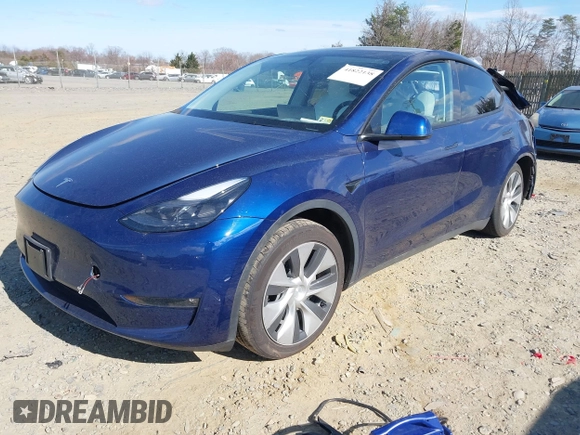 2023 Tesla Model Y Long Range with VIN 7SAYGDEE3PF674457, listed as a IAAI auction lot 41822138 with 43,901 mi miles. Bid and sale history available at carsss.com. Image 18.