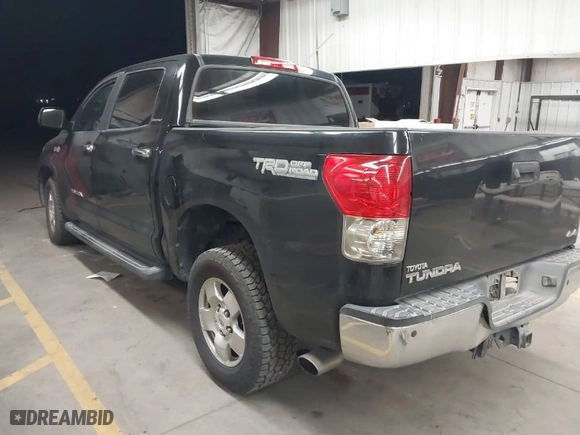 2007 Toyota Tundra LTD with VIN 5TBDV58147S490830, listed as a IAAI auction lot 41823276 with 294,520 mi miles. Bid and sale history available at carsss.com. Image 3.