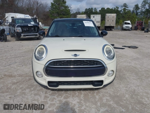 2017 MINI Hardtop 4 Door Cooper S z VIN WMWXU3C54H2D32602, wystawiony jako IAAI lot #41458333 z przebiegiem 124 235 mil mil oraz . Historia ofert i sprzedaży dostępna na DreamBid. Obrazek 12.