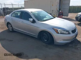 2009 Honda Accord LX-P z VIN 1HGCP26419A121692, wystawiony jako IAAI lot #38481852 z przebiegiem 321 621 mil mil oraz . Historia ofert i sprzedaży dostępna na DreamBid. Obrazek 1.