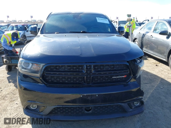 2015 Dodge Durango R/T with VIN 1C4SDHCT5FC937676, listed as a IAAI auction lot 41369508 with 107,075 mi miles and . Bid and sale history available at DreamBid. Image 12.