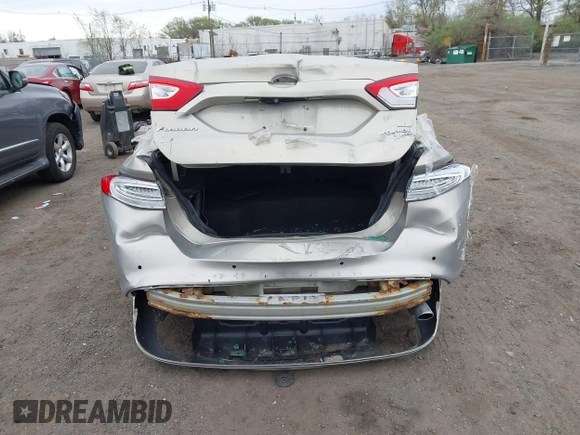 2015 Ford Fusion SE Hybrid with VIN 3FA6P0LU6FR210606, listed as a IAAI auction lot 42070466 with 123,043 mi miles and . Bid and sale history available at DreamBid. Image 17.